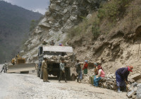 FILE PHOTO: Labourers work on India's Tezpur-Tawang highway which runs to the Chinese border in the northeastern Indian state of Arunachal Pradesh