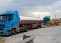 Oil tankers are pictured near the Iraqi border with Turkey, on the outskirts of Duhok province