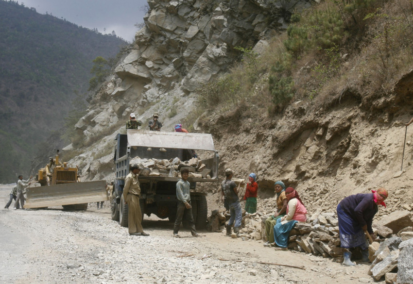 FILE PHOTO: Labourers work on India's Tezpur-Tawang highway which runs to the Chinese border in the northeastern Indian state of Arunachal Pradesh